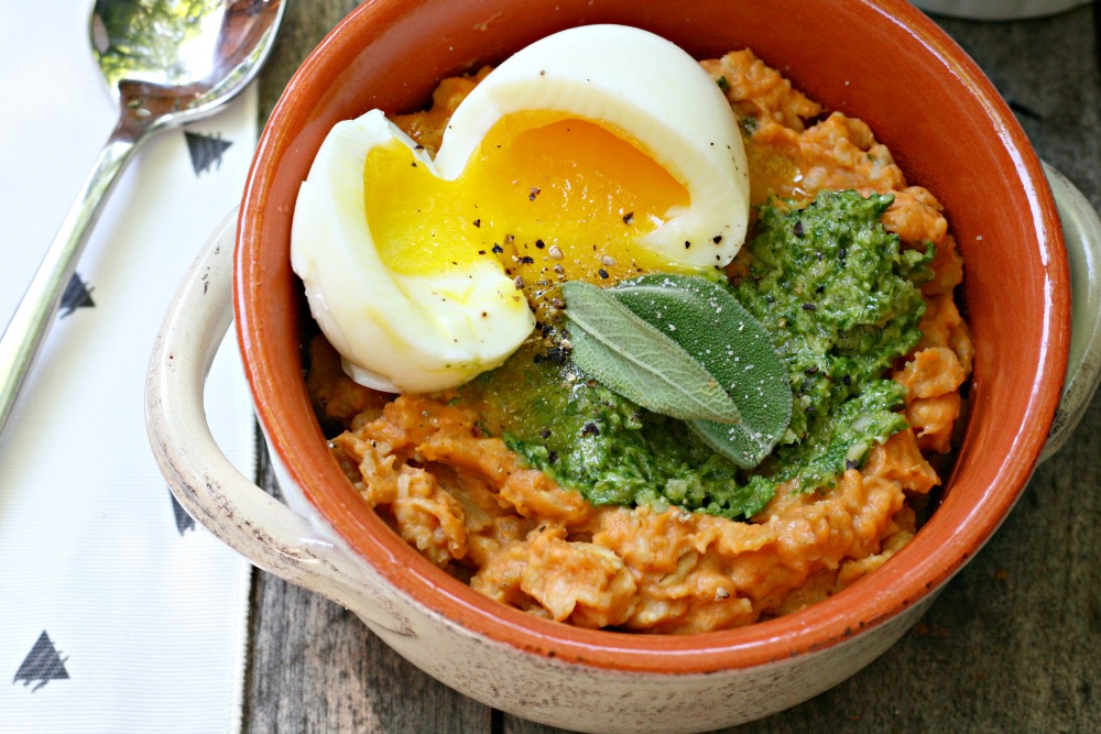 Purely Pumpkin savory herbed pumpkin oatmeal with soft-boiled eggs and pumpkin seed pesto close up